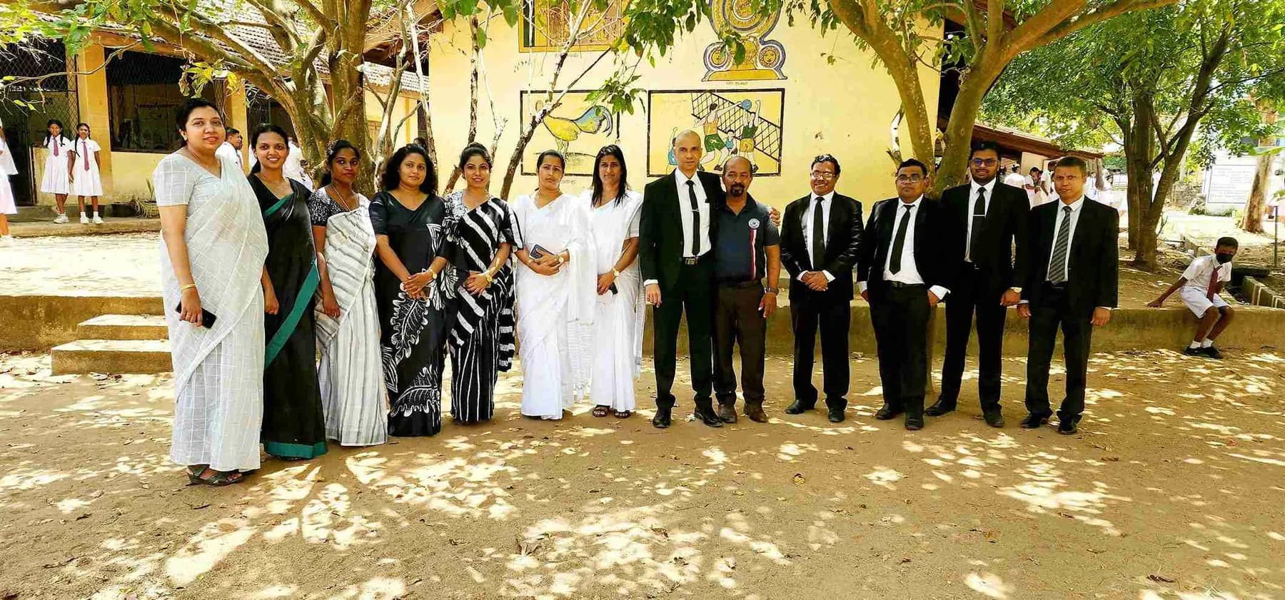The firm’s attorneys at a community programme